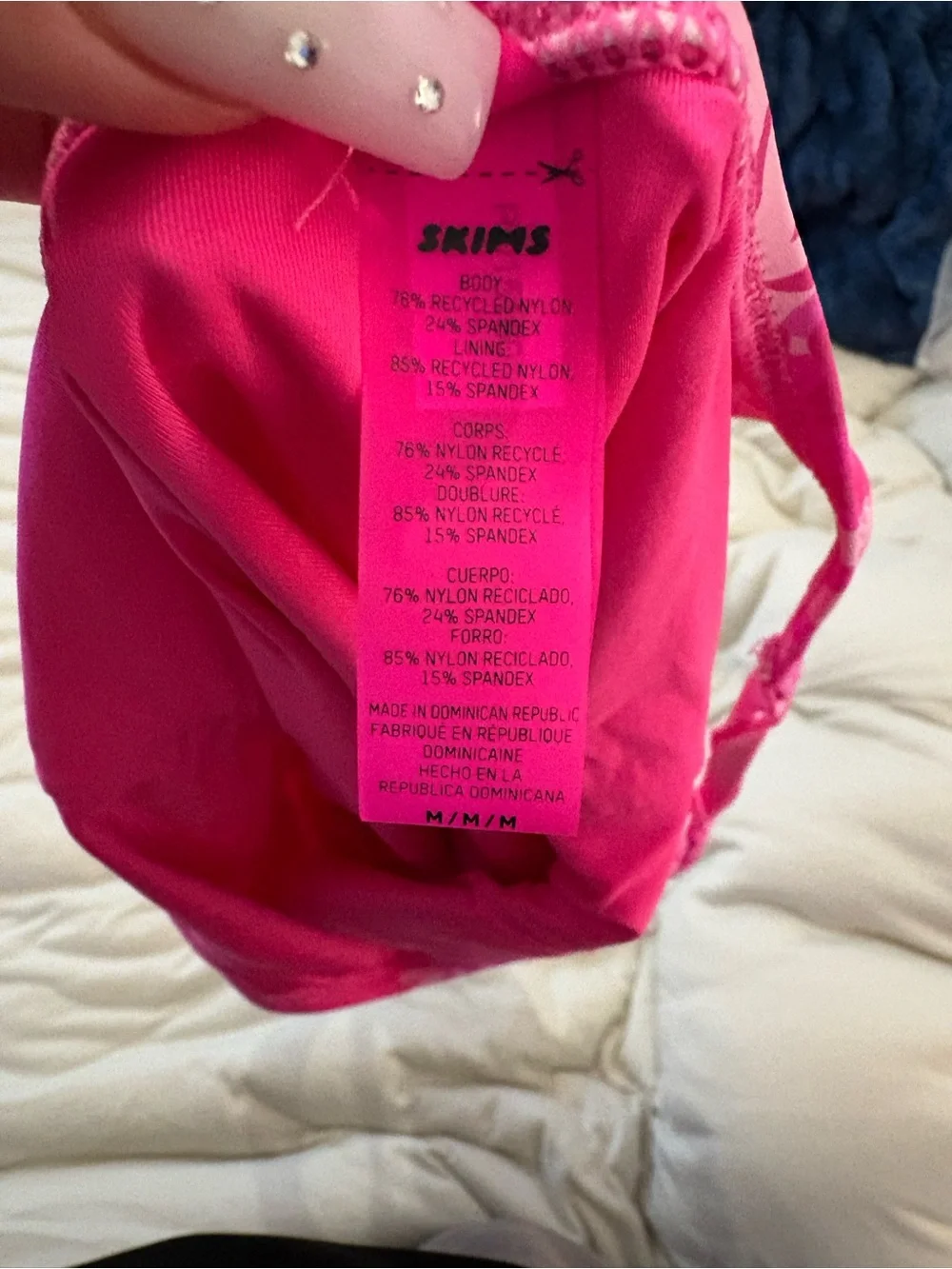 Women’s SKIMS pink camoflauge one piece bathing suit, size medium great conditio